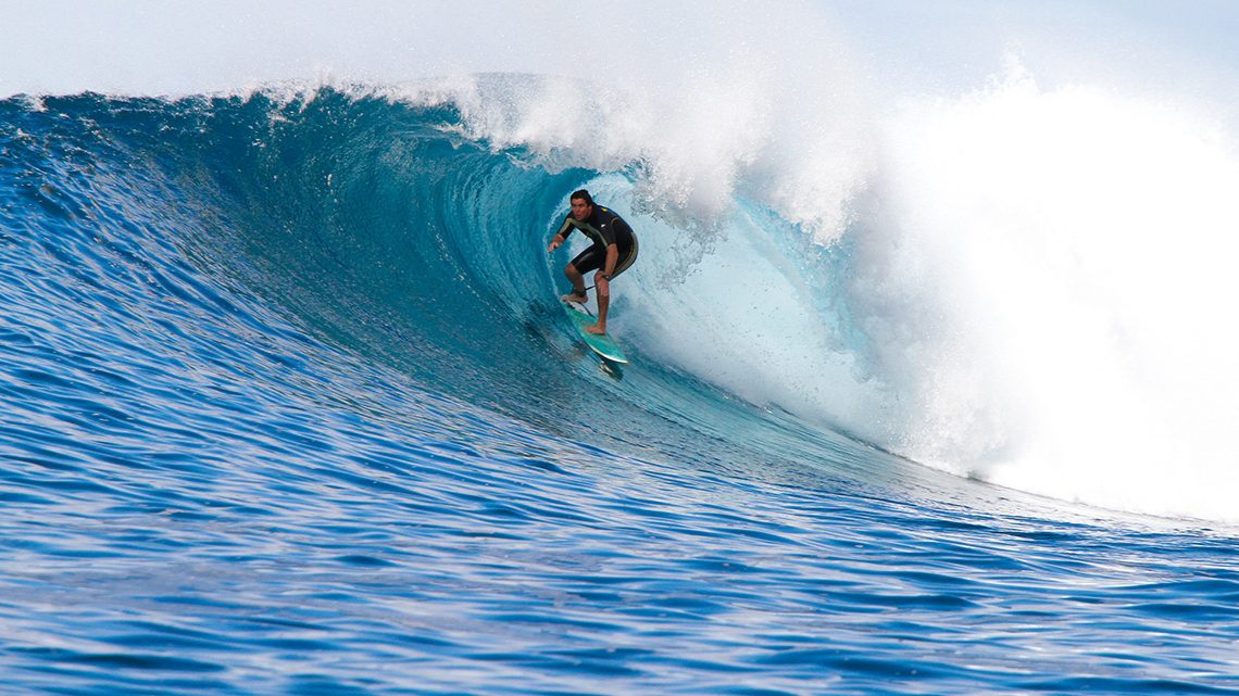 A surfer riding deep inside the barrel of a wave at Pa&uacute;l do Mar on Madeira&rsquo;s west coast